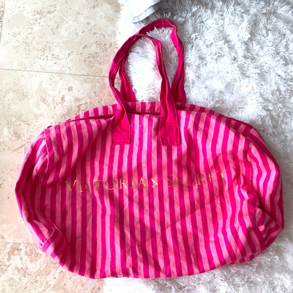 Victoria’s Secret pink/gold duffel zipper bag
